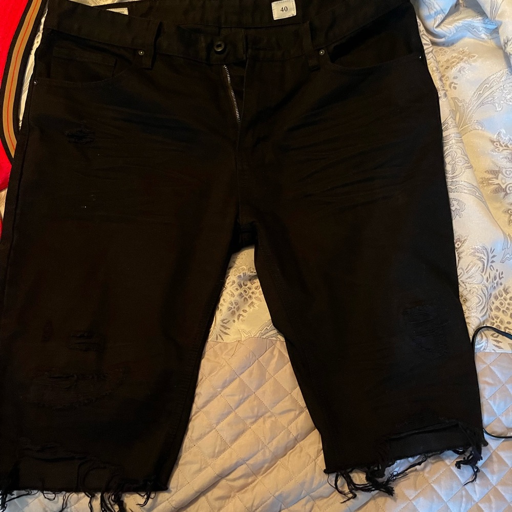 Black distressed jean shorts